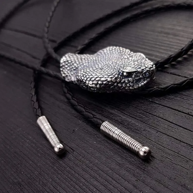 Silver Rattlesnake Bolo Tie Life Size Silver Stainless Steel Black Braided Cord with Silver Tips