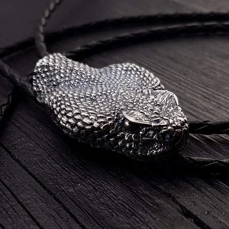 Silver Rattlesnake Bolo Tie Life Size Silver Stainless Steel Black Braided Cord with Silver Tips